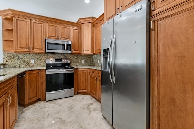 kitchen with ornamental molding, light stone counters, backsplash, and appliances with stainless steel finishes