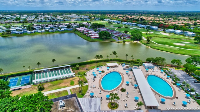 birds eye view of property featuring a water view