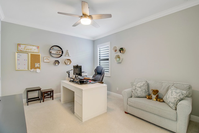 home office featuring crown molding, ceiling fan, and light colored carpet