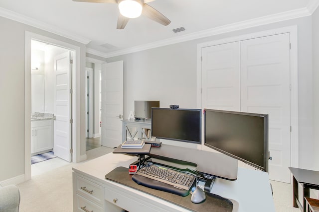 office with crown molding, light carpet, and ceiling fan