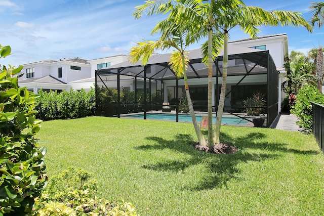 view of yard featuring a lanai