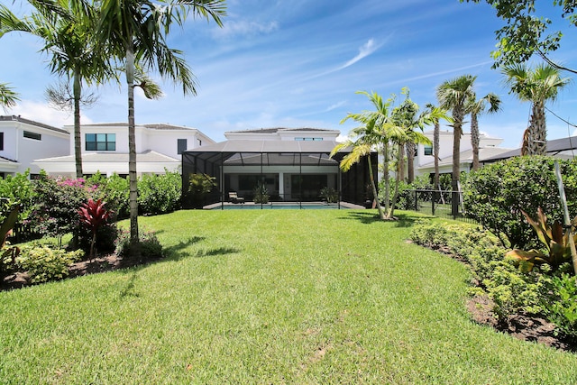 view of yard with a lanai