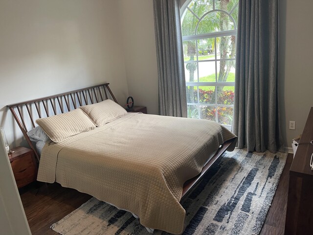 bedroom featuring wood finished floors