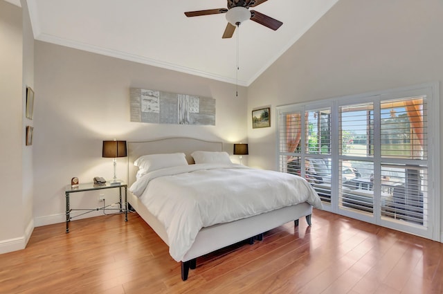 bedroom with wood-type flooring, crown molding, ceiling fan, access to outside, and high vaulted ceiling