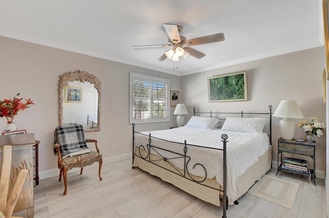 bedroom with crown molding, light hardwood / wood-style floors, and ceiling fan