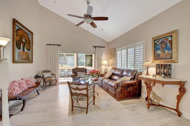 living room with ceiling fan, a healthy amount of sunlight, light hardwood / wood-style flooring, and crown molding