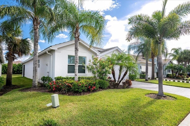 view of front of home featuring a front lawn