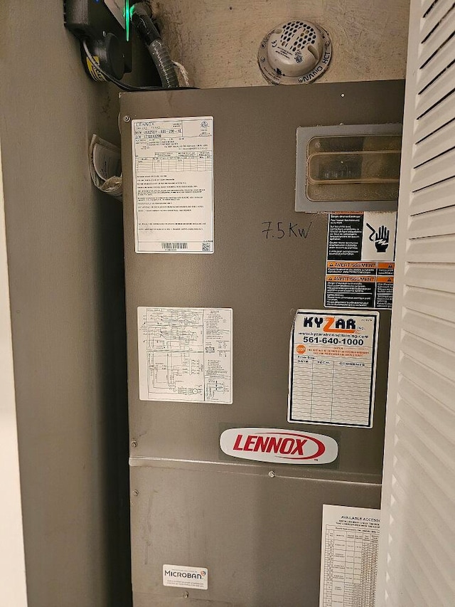 utility room with heating unit