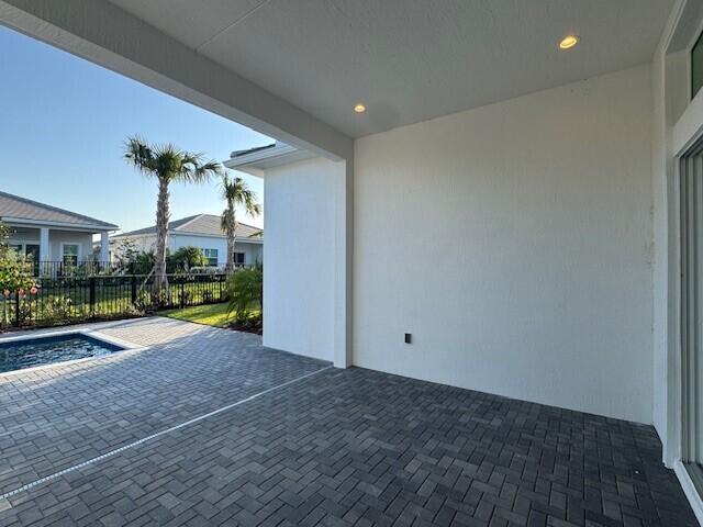 view of exterior entry featuring french doors