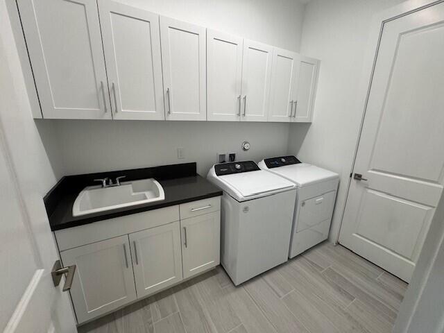 kitchen featuring white cabinetry, decorative light fixtures, dark wood-type flooring, and a kitchen island