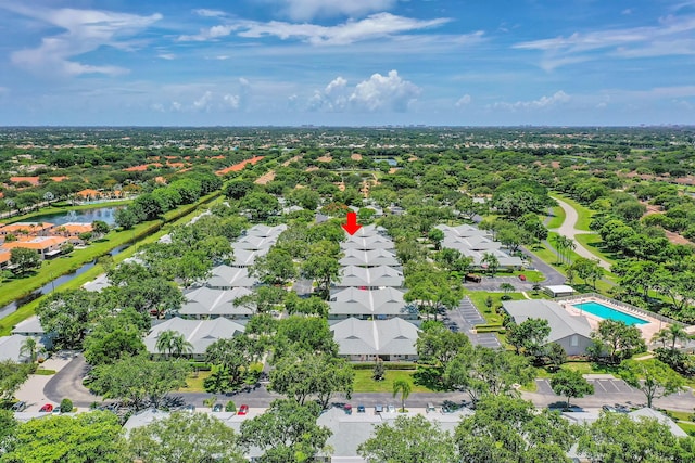 birds eye view of property featuring a water view and a residential view
