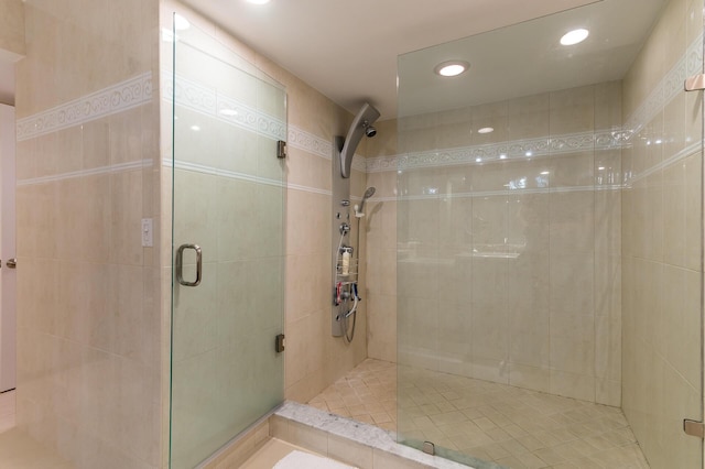 1155 Hillsboro Mile Unit 305, Hillsboro Beach, FL 33062 - bathroom featuring a shower stall and recessed lighting
