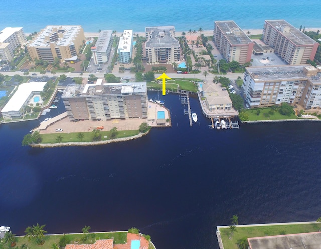 aerial view featuring a water view and a city view