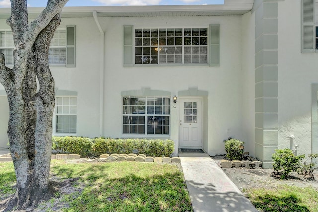 view of front of home featuring stucco siding