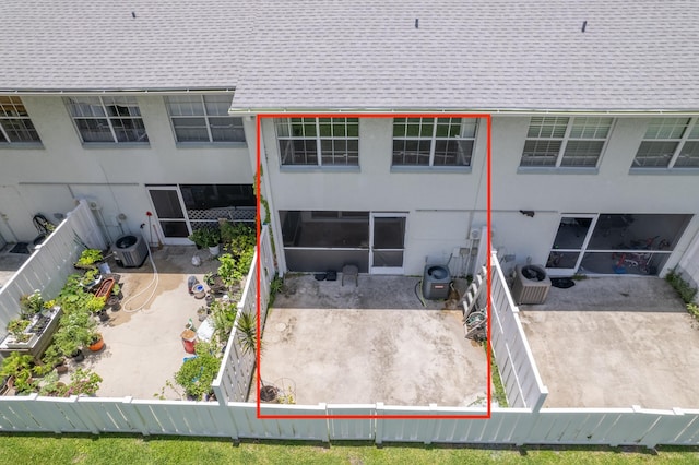 view of front of home featuring a patio area and central AC unit