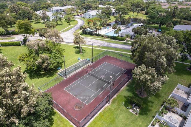 birds eye view of property with a residential view