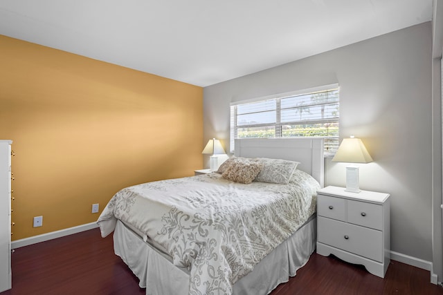 bedroom featuring dark wood-type flooring