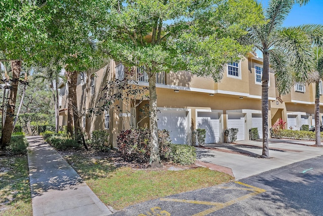 view of property with a garage