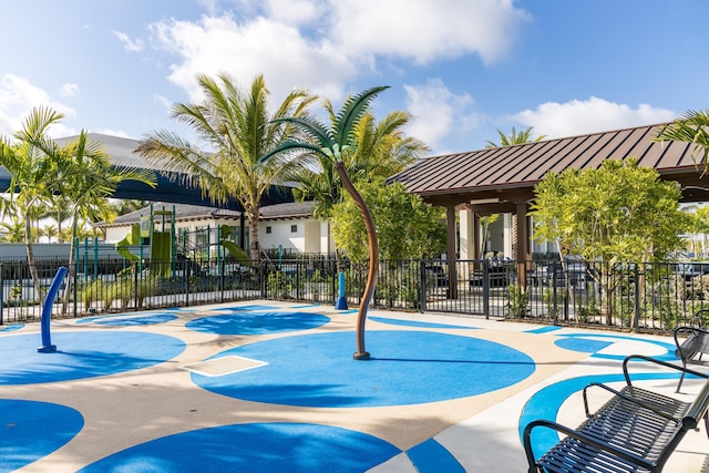 view of pool featuring a playground