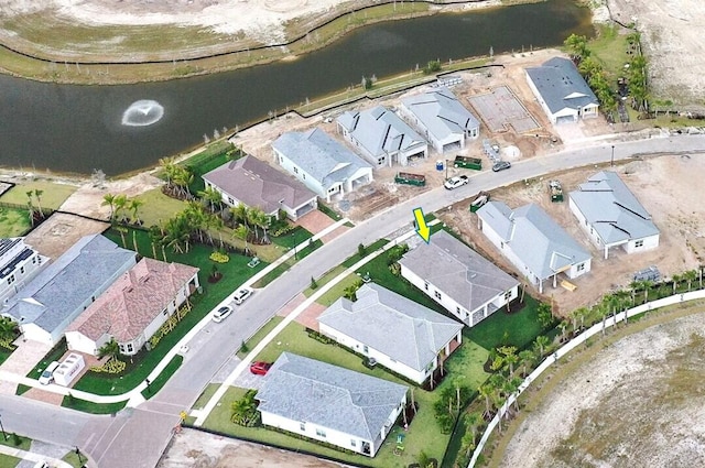 birds eye view of property with a residential view