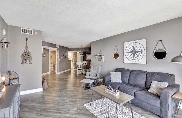 living room with wood-type flooring