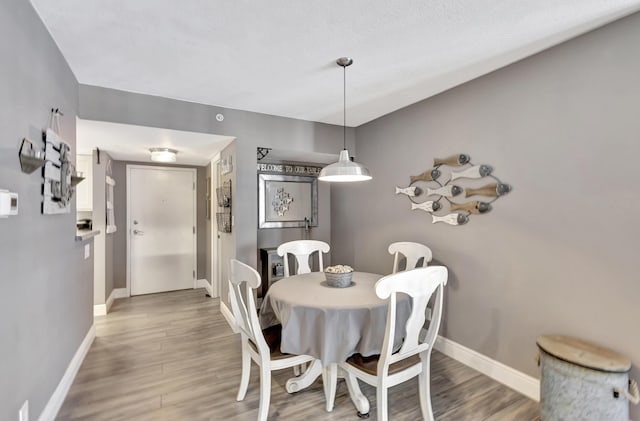 dining room featuring hardwood / wood-style floors