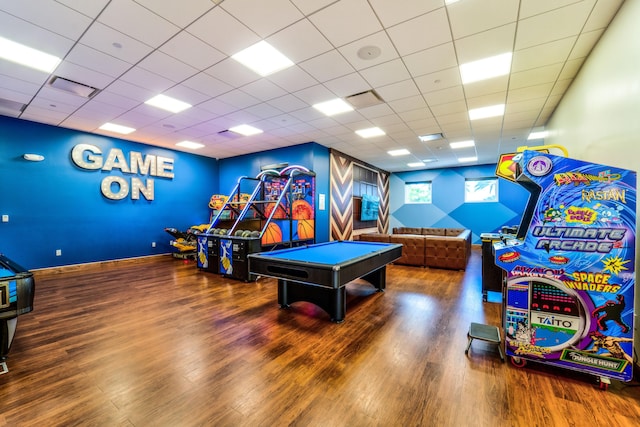 rec room featuring pool table, a paneled ceiling, and hardwood / wood-style floors