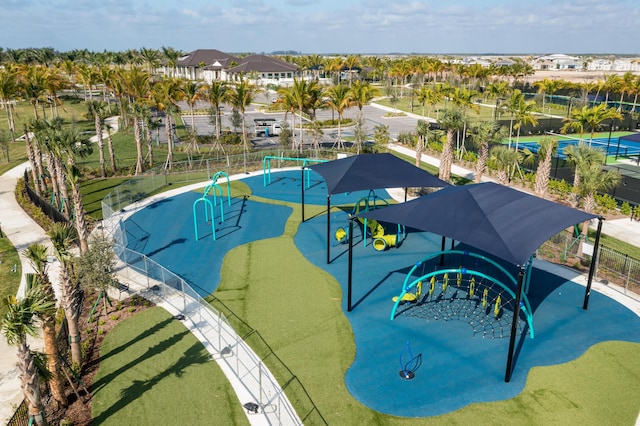 view of swimming pool with a playground