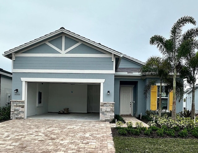 view of front of property with a garage