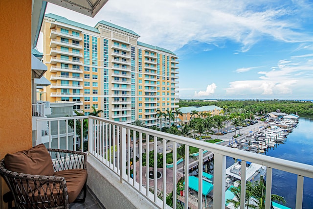 balcony featuring a water view