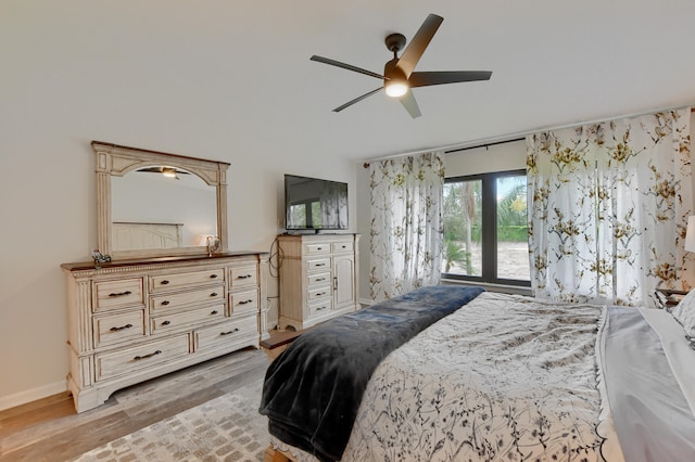 bedroom with ceiling fan and light wood-type flooring