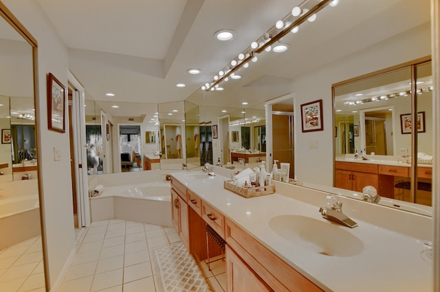 bathroom with vanity, shower with separate bathtub, and tile patterned flooring