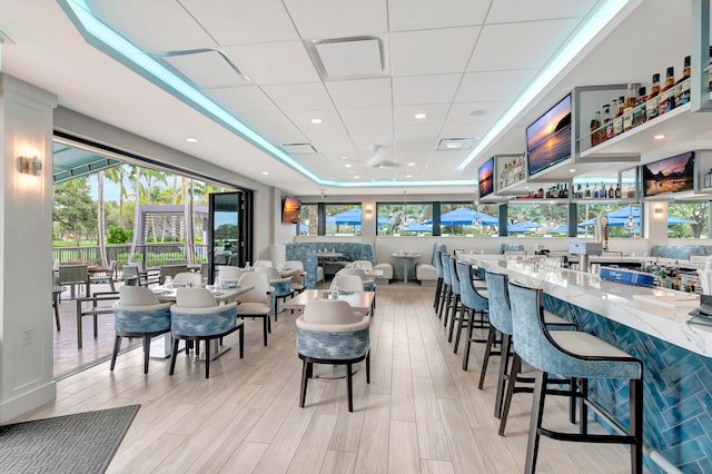 dining space featuring light hardwood / wood-style flooring