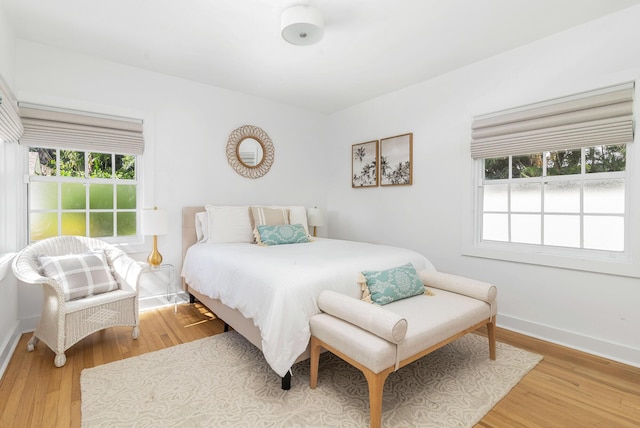 bedroom featuring wood-type flooring