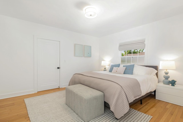 bedroom with light hardwood / wood-style flooring