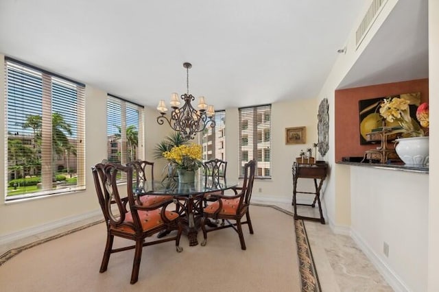 dining area with a chandelier