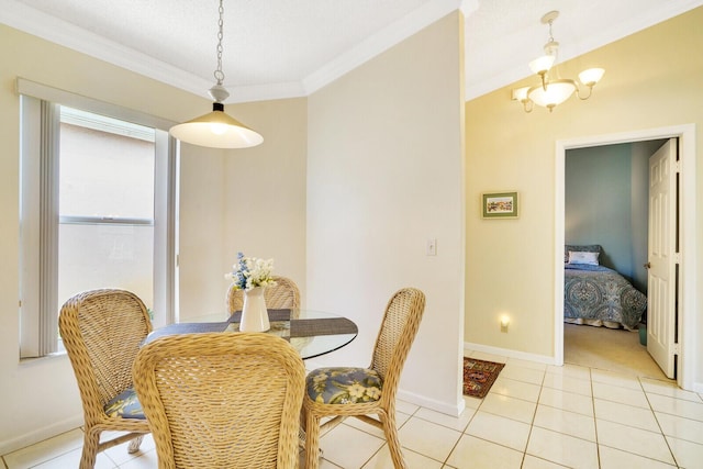 tiled dining room featuring crown molding and a notable chandelier