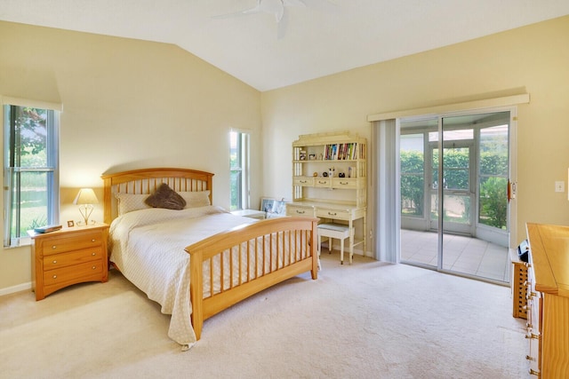 carpeted bedroom with ceiling fan, lofted ceiling, and access to outside