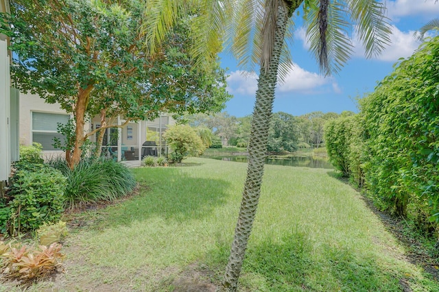 view of yard with a water view