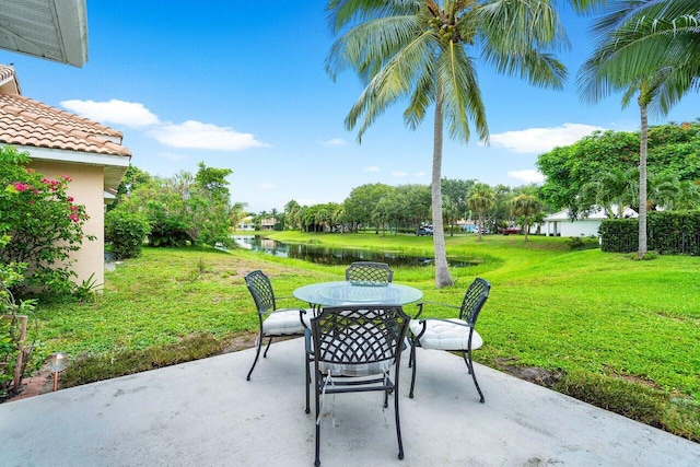 view of patio / terrace featuring a water view