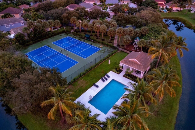 birds eye view of property featuring a water view