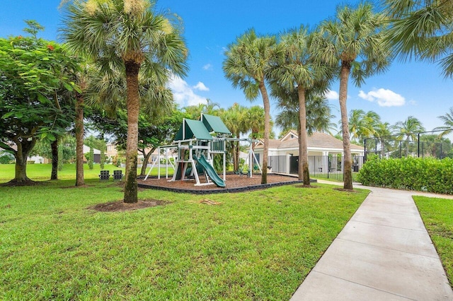 view of jungle gym with a lawn