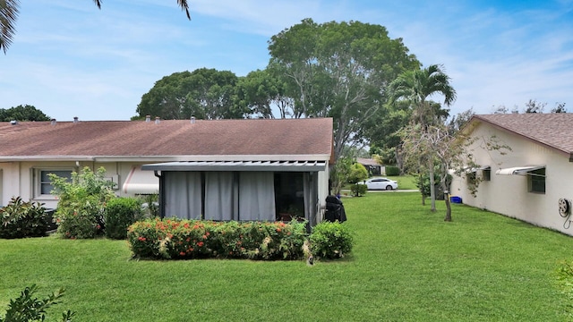 exterior space featuring a lawn