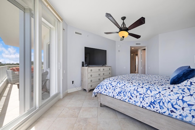 bedroom with ceiling fan and light tile patterned floors