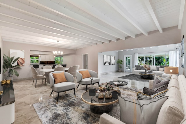 living room featuring beam ceiling and an inviting chandelier