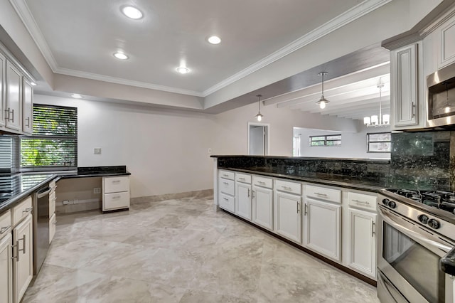 kitchen with crown molding, appliances with stainless steel finishes, dark stone countertops, tasteful backsplash, and white cabinets