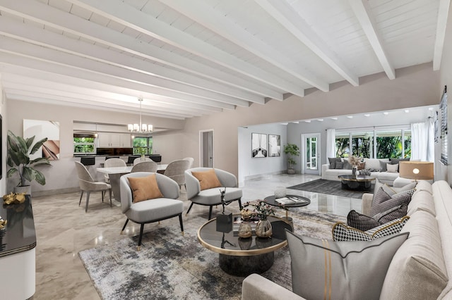 living room with beam ceiling and an inviting chandelier