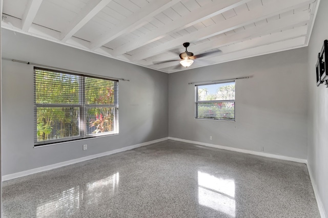 unfurnished room featuring beam ceiling and ceiling fan