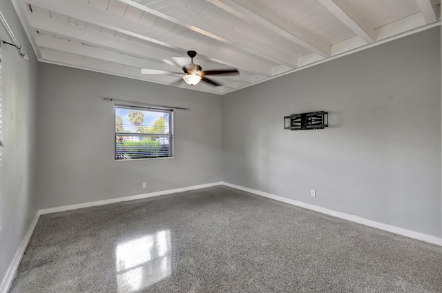 empty room featuring ceiling fan, wood ceiling, and beamed ceiling