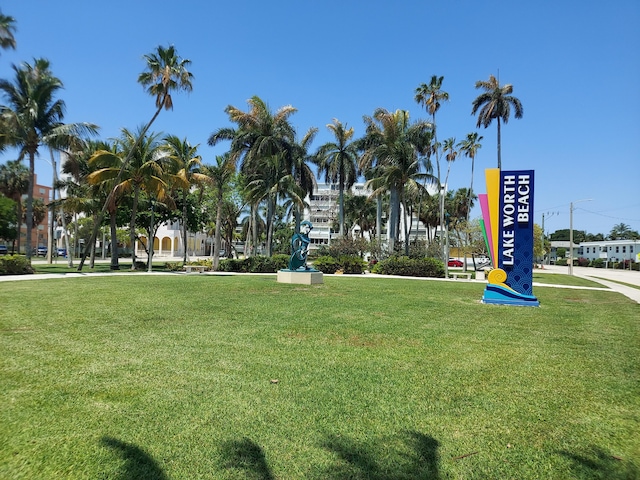 view of home's community featuring a yard